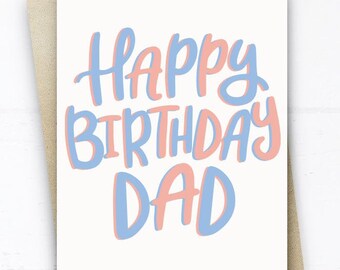 May include: A white card with the text "Happy Birthday Dad" in blue and pink lettering.