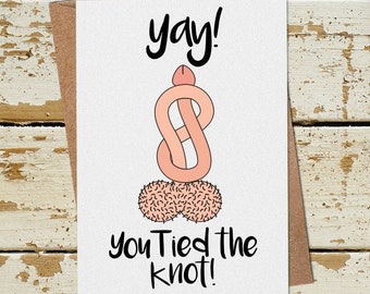 May include: A humorous wedding card with a cartoon illustration of a tied knot and the text "yay! you tied the knot!"