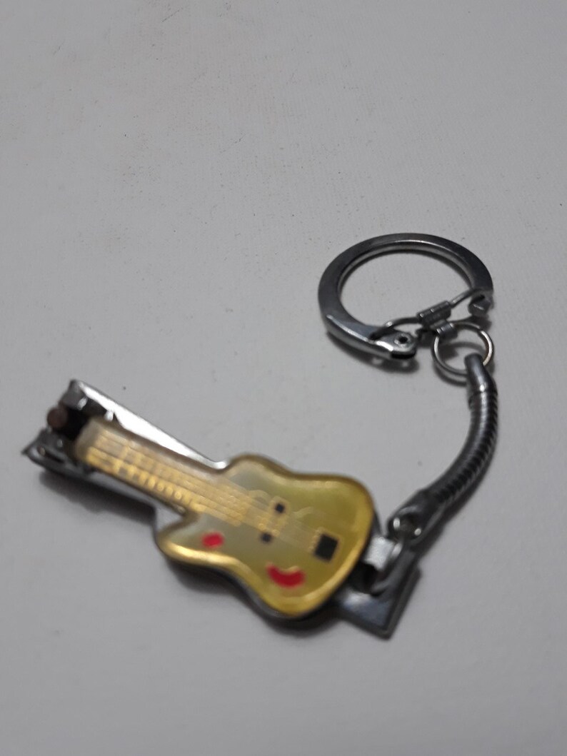 vintage keychain vintage collectibles guitar keychain keychain collection, Guitar nail clipper keychain