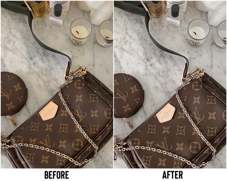 May include: A brown and gold Louis Vuitton handbag with a chain strap and a matching coin purse. The bag is on a white marble surface.