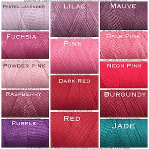 May include: A color chart of embroidery floss with 12 different colors. The colors are: Pastel Lavender, Lilac, Mauve, Fuchsia, Pink, Pale Pink, Powder Pink, Neon Pink, Raspberry, Dark Red, Red, Burgundy, Purple, and Jade.