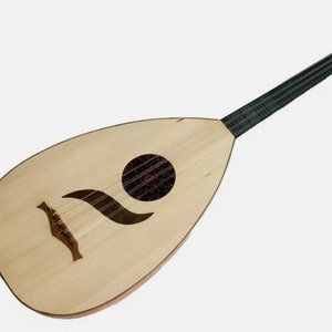 May include: A wooden oud with a pearlescent inlay around the sound hole. The oud has a black fretboard and a light wood body.