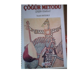 The Method Of Turkish Short Neck  Saz In English
