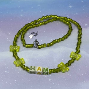 Collar de letras del alfabeto de jamón verde