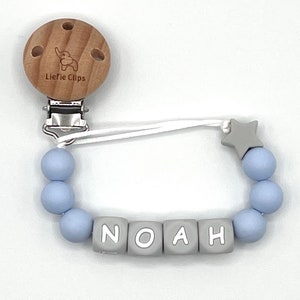 baby blue pacifier clip with gray letters, pacifier clip with gray letters, silicone pacifier clip, baby blue pacifier clip, gray pacifier clip, blue pacifier holder, baby shower gift, baby gift, pacifier clip for boys, pacifier clip for girls