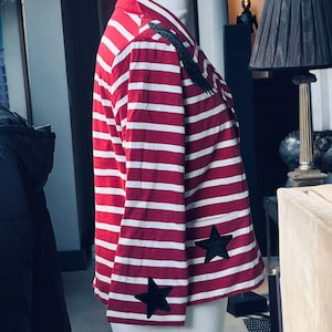 Red and white striped  lightweight Jacket style sweatshirt  with black sequin angel wings and black sequin stars size UK 16