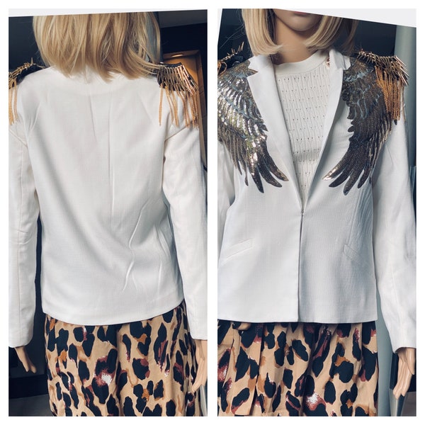 Cream single hook blazer with gold sequin angel wings and removable gold spiky epaulettes  size 8