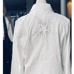 White double breasted  gold buttoned Jacket with a.multicoloured rhinestone star size   XX large but fits sizes UK 8 to 10