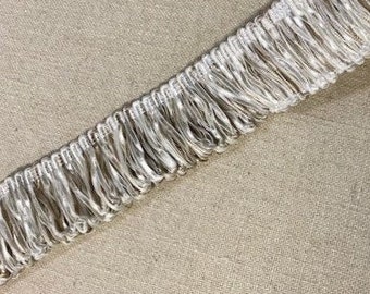 White Fringe Trim Looped 70mm X The Meter Rayon/Polyester White Fringe Trim Looped 70mm X The Meter Rayon/Polyester