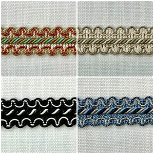 May include: Four samples of decorative trim with a scalloped edge. The trim is woven with a rope-like texture and features a variety of colors, including red, blue, black, and beige.