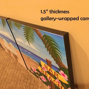 May include: A three-panel gallery-wrapped canvas print depicting a beach scene with palm trees, blue water, and a sign that reads "Bar Beach". The canvas is 1.5 inches thick.