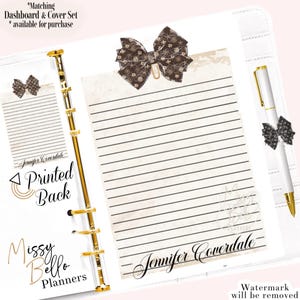 May include: A planner set with a gold binder, lined paper, and a pen. The set includes a decorative bow clip and a bow on the pen. The paper has the text "Jennifer Coverdale" and "Printed Back". The planner is from "Missy Bello Planners".