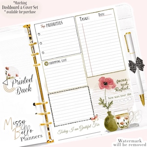 May include: A white planner with gold accents, featuring sections for tasks, shopping lists, and top priorities. Includes a pen with a decorative bow and floral illustrations. The text reads "Printed Back" and "Missy Bello Planners."
