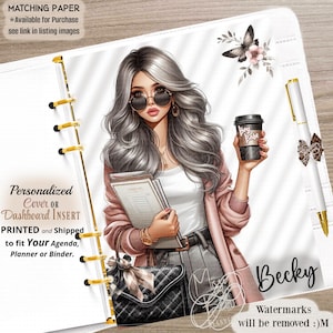 May include: A planner dashboard insert featuring an illustration of a person with long grey hair, round sunglasses, and a pink cardigan, holding a coffee cup and documents. The design includes a black handbag, a white pen, and the name Becky in script.
