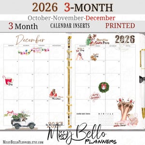 May include: A 2026 3-month calendar insert for October, November, and December featuring a gold ring binder. The December page includes holiday-themed illustrations like Christmas lights, a puppy, a wreath, and festive text labels.