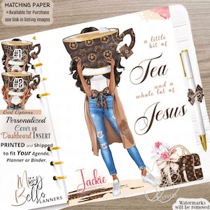 May include: A personalized planner dashboard insert featuring an illustration of a person holding a large teacup, wearing a tan cardigan, blue jeans, and white sneakers. The text reads a little bit of Tea and a whole lot of Jesus and Jackie.