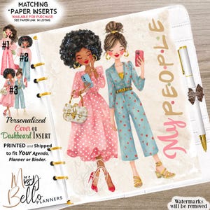 May include: A personalized planner dashboard insert featuring an illustration of two figures, one in a pink polka-dot dress and one in a blue patterned jumpsuit, with the text MY PEOPLE in gold and pink, alongside a white pen with gold accents.