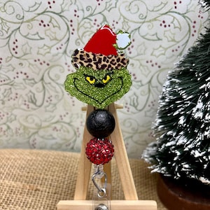 Green Guy with Leopard Badge Reel