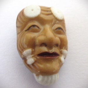 Arita Japanese Porcelain Toshikane Okina-J138-Japanese Gods Button- Shows a Face that is a Beige W/ White accent-buttonologist-Arita Button