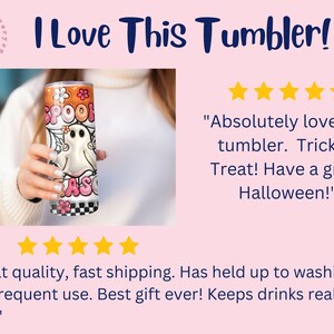 May include: A white and orange stainless steel tumbler with a ghost and the words "Spook Season" on it. The tumbler is being held by a person's hand. The text "I Love This Tumbler!" is at the top of the image. Five stars are displayed below the image. The text "Absolutely love this tumbler. Trick or Treat! Have a great Halloween!" is below the stars. Five stars are displayed below the text. The text "Great quality, fast shipping. Has held up to washing and frequent use. Best gift ever! Keeps drinks really cold." is below the stars.