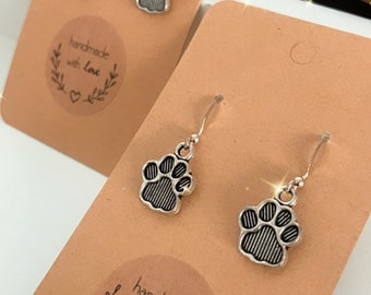 Paw print charms, dog lovers, paw print earrings, dog earrings, animals, animal earrings, dangle and drop silver earrings