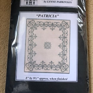 May include: A cross-stitch pattern for a rug called "Patricia" by Peppermint Designs by Lynne Parkinson. The pattern is for a rug that is 8 inches by 9 1/2 inches when finished.