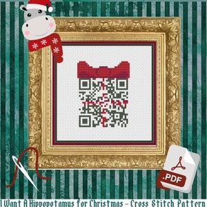 May include: A cross stitch pattern featuring a red bow and a QR code. The pattern is framed in gold and has a green and white striped background. The text "I Want A Hippopotamus for Christmas - Cross Stitch Pattern by GrandmabeWildin" is at the bottom of the image.