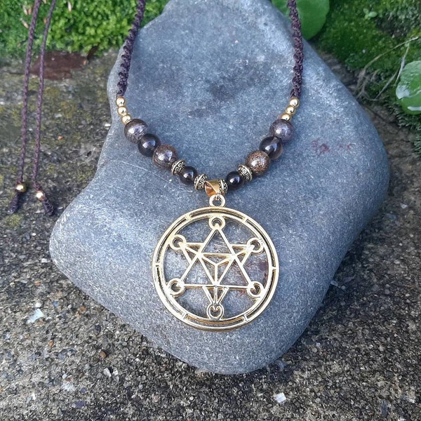 Pendentif magique au symbole Sacré "Merkaba" en Bronzite et Quartz fumé.