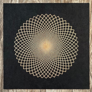 May include: A gold geometric mandala design on a black background. The mandala is made up of a series of concentric circles and squares.