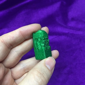 Two Cthulhu Amulets, Cthulhu idol, made of PLA in 3D printing, small green pocket figure, Cthulhu Amulet in metal