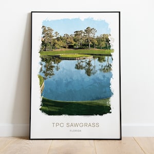 Può includere: Un dipinto ad acquerello di un campo da golf con uno stagno e erba verde. Il testo "TPC Sawgrass, Florida" è in basso nell'immagine.