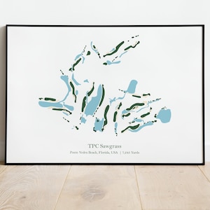 May include: A black and white print of a golf course layout, with green and blue shapes representing the holes. The text "TPC Sawgrass, Ponte Vedra Beach, Florida, USA | 7,243 Yards" is printed below the image.