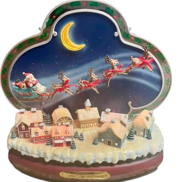 Enesco ~ Animación con Papá Noel y renos en movimiento ~ Canción musical “Santa is coming to Town”