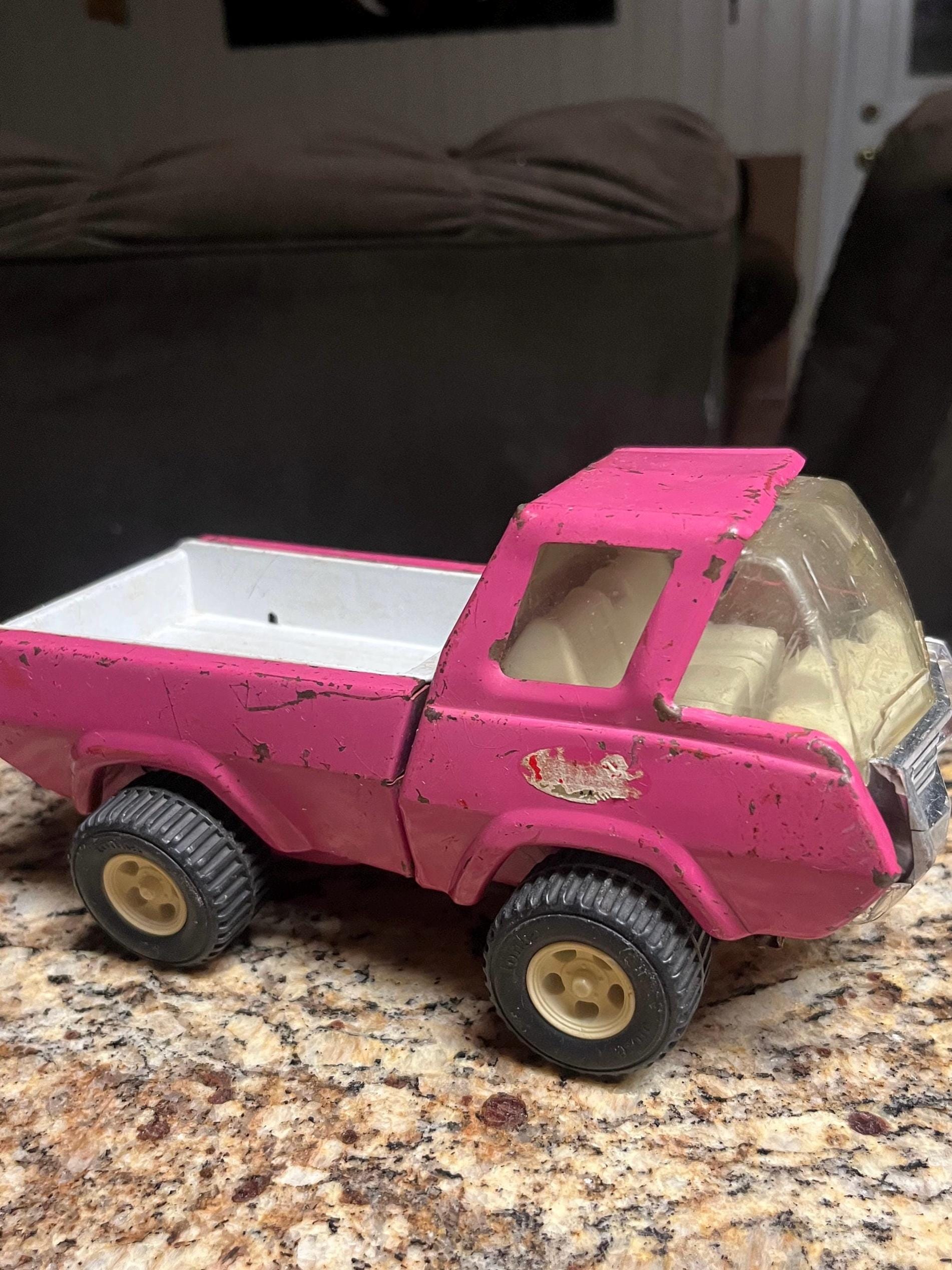 Pink tonka dump truck sale