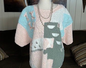 Mervyn's Partners II • vintage • Rose/blanc/gris/bleu • Floral/géométrique • Taille 1X • Pull