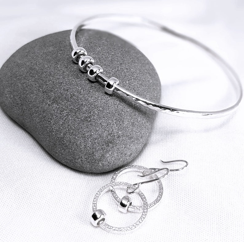 Sterling Silver Bangle Bracelet, Hammered Silver Bangle with Ring Charms, Charm Bracelet, Fidget Jewellery, Birthday Bangle with Charms image 10
