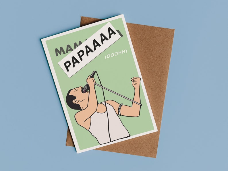 May include: A green and white greeting card with a cartoon illustration of a person singing into a microphone. The card has the text "Mama" and "Papaaa" written on it.