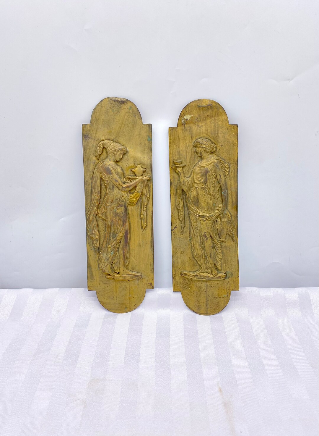Pair of Victorian Classical Revival Metal Wall Plaques in Relief
