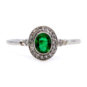 Diamond emerald platinum halo ring 7518-4916