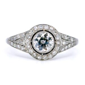 Diamond platinum halo ring 12837-5048