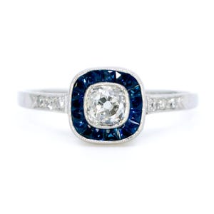 Diamond sapphire platinum halo ring 6866-4862