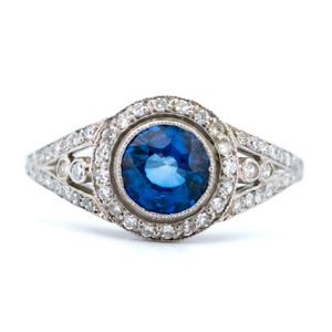 Diamond sapphire platinum halo ring 13262-5090