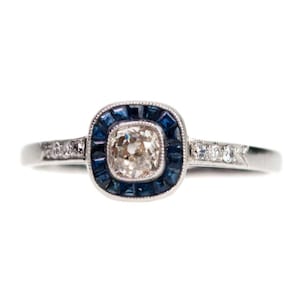 Diamond sapphire platinum halo ring 6988-0010