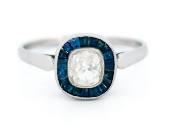 Diamond sapphire platinum halo ring 13246-5053