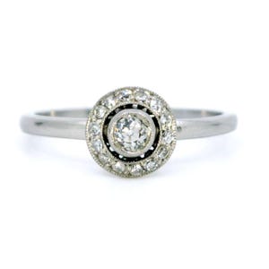 Diamond platinum halo ring 10480-0047