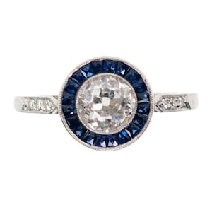Diamond sapphire platinum halo ring 6961-4858