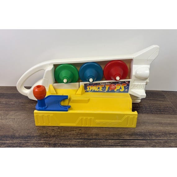 プイイ・フュイッセ 1988 J.G. Mortier & Co Vintage 1988 Fisher Price Space Tops Toy Spinning Top Rocket