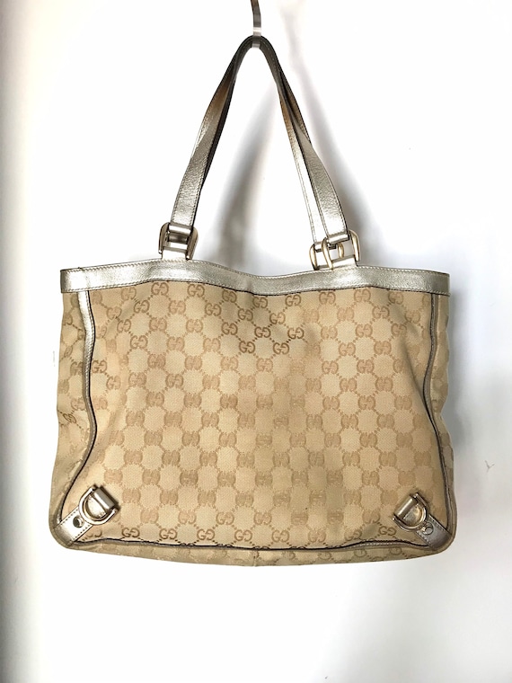 A vintage Gucci golden beige canvas and silver lea