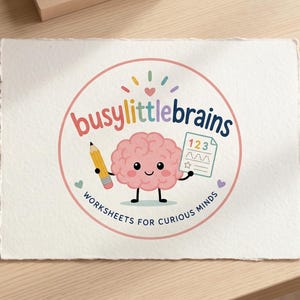 May include: A rectangular piece of paper featuring a circular logo with the text busylittlebrains and WORKSHEETS FOR CURIOUS MINDS. The logo depicts a pink cartoon brain holding a yellow pencil and a worksheet with the numbers 123.