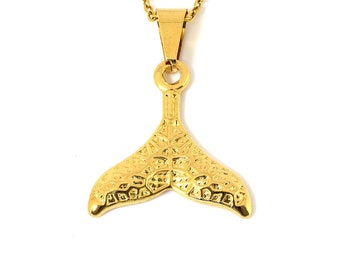 May include: A gold-tone mermaid tail pendant necklace. The pendant is detailed with a textured design.